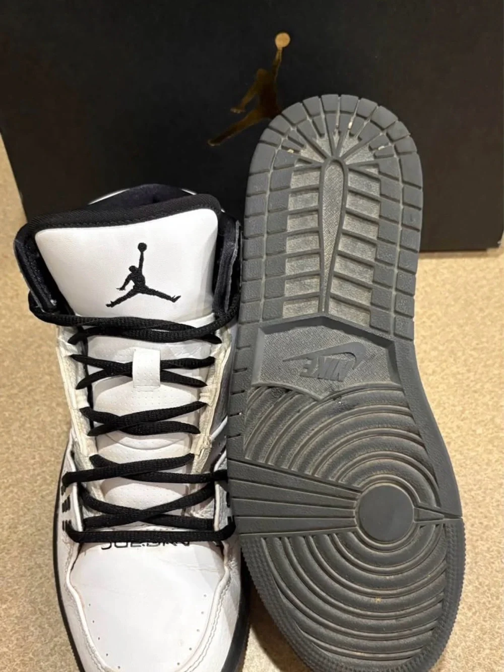 Jordan Men’s White and Black High-Top Sneakers